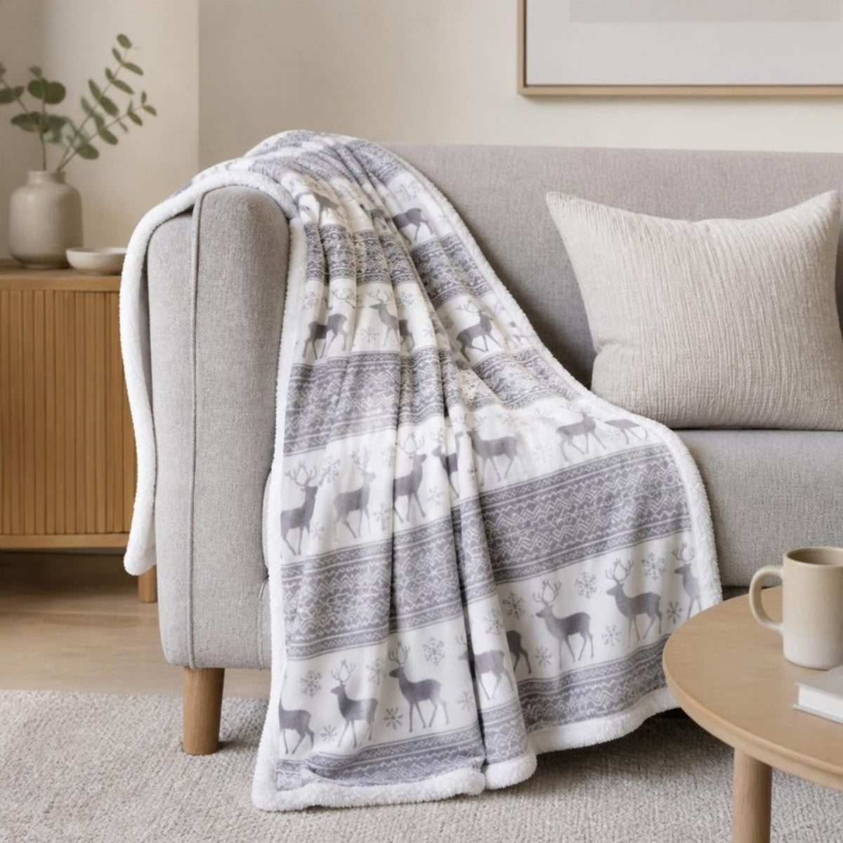Nordic throw draped over a sofa - APA Pure Living