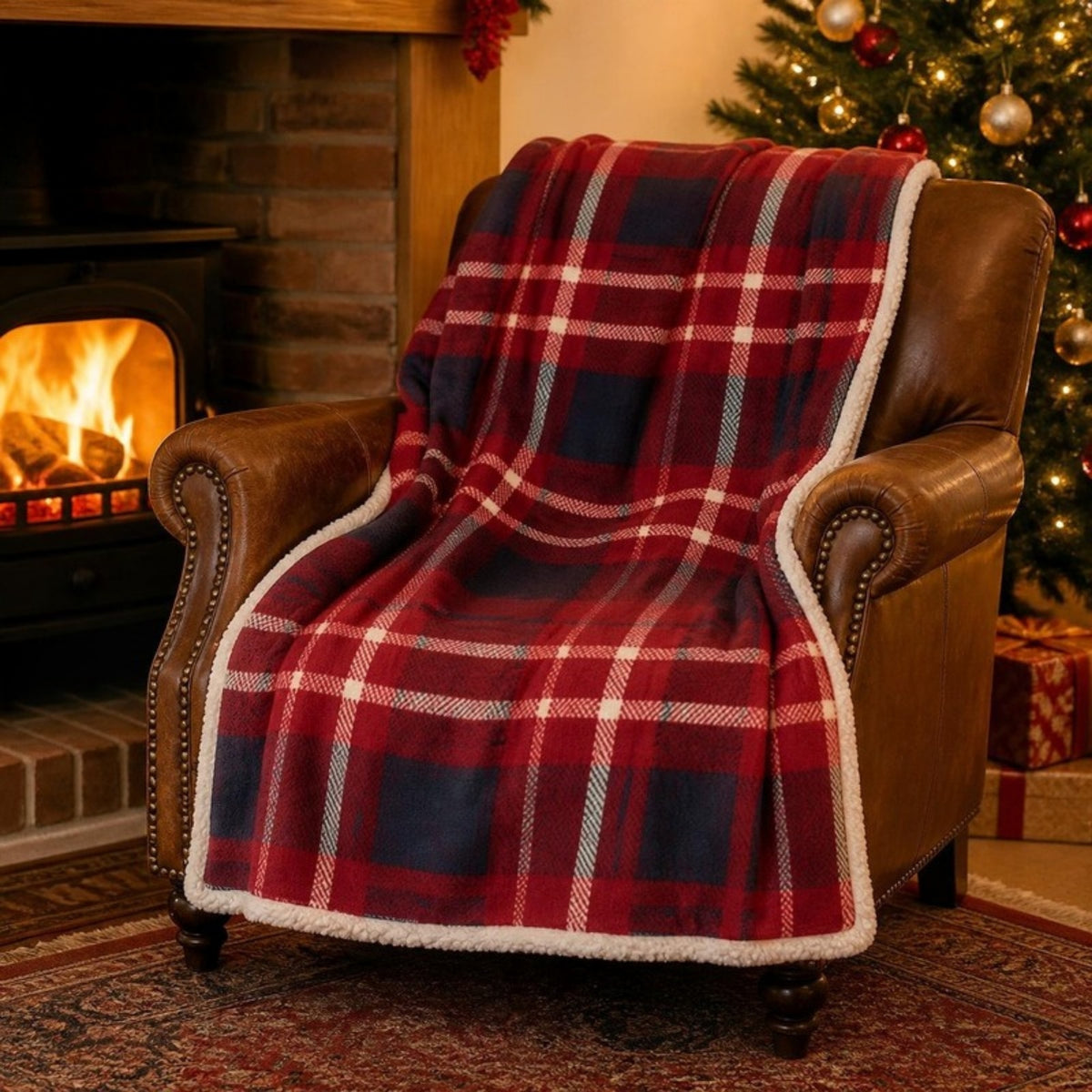 Tartan throw on a sofa by the fire - APA Pure Living