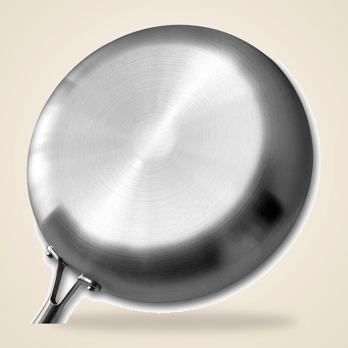 Underside of the stainless steel frying pan