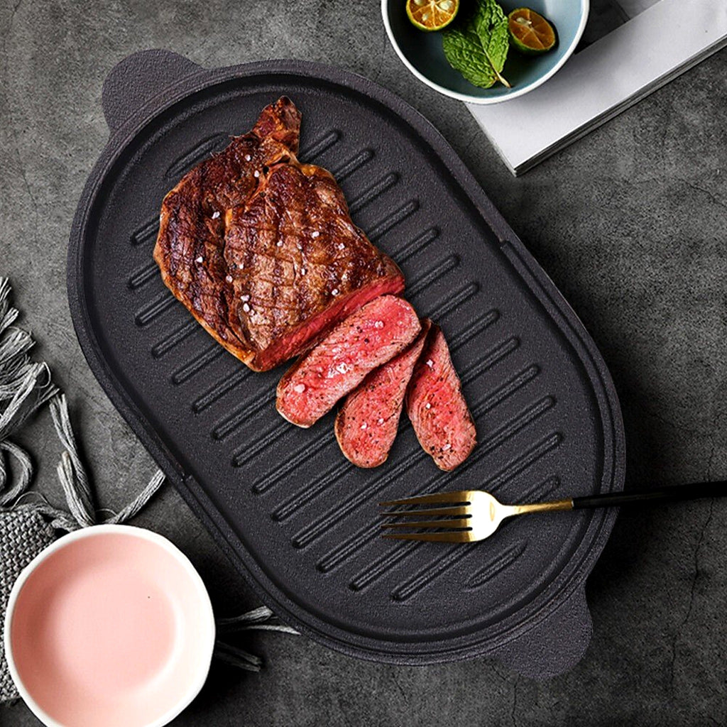 Sliced steak on the ribbed cast iron skillet lid