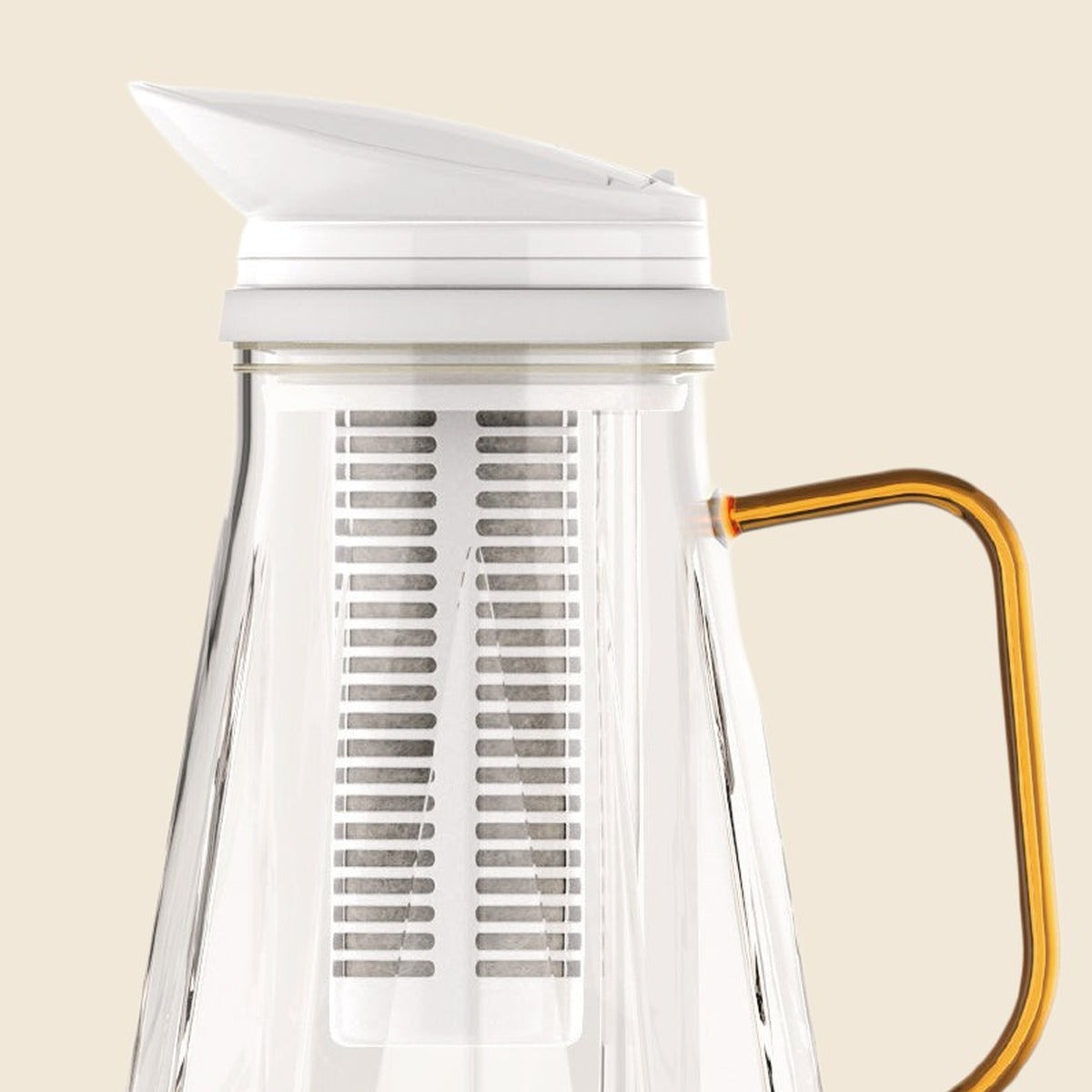 Close-up of the glass filter jug lid and filter cartridge