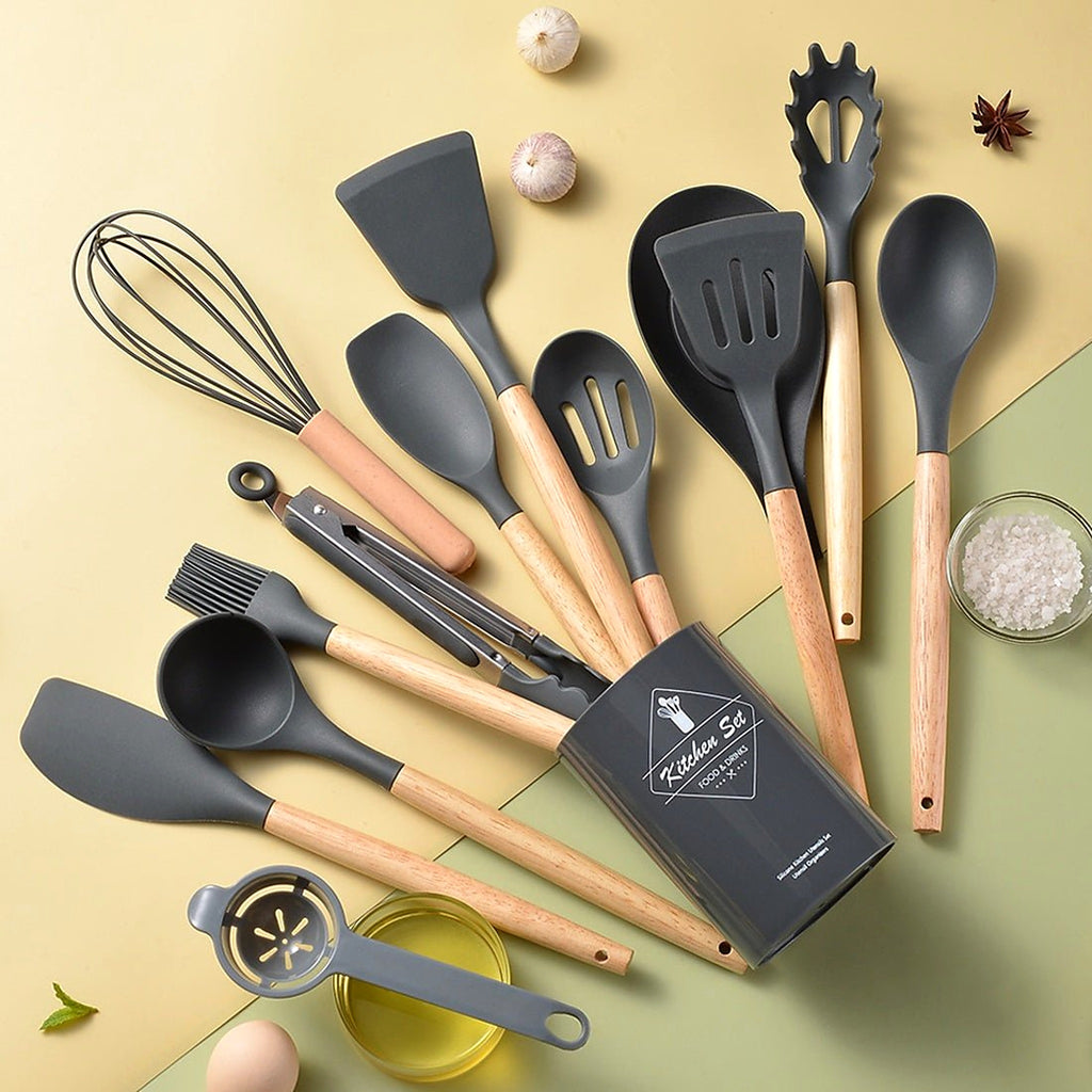 14-piece silicone utensil set with wooden handles and holder