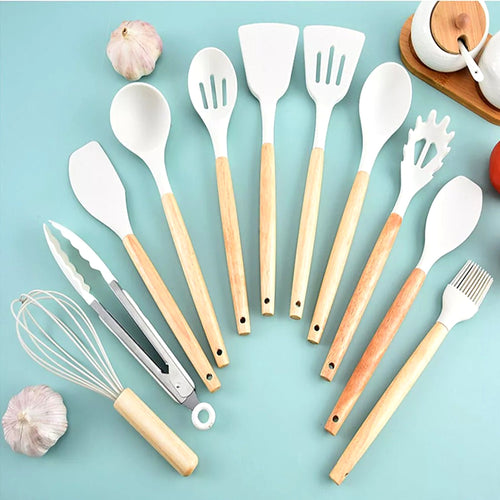 White silicone utensils with wooden handles fanned out