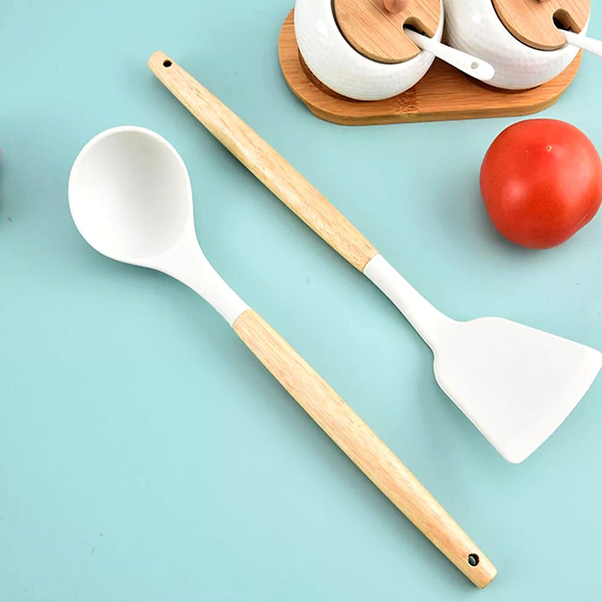 White silicone spoon and turner with wooden handles