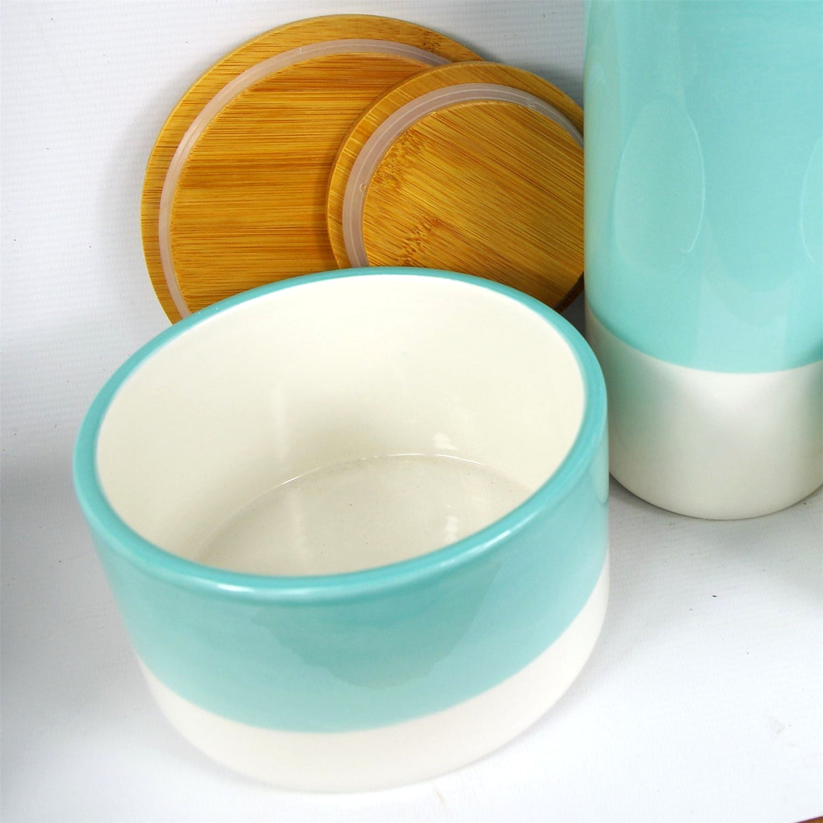 Ceramic canisters with bamboo lids, top view