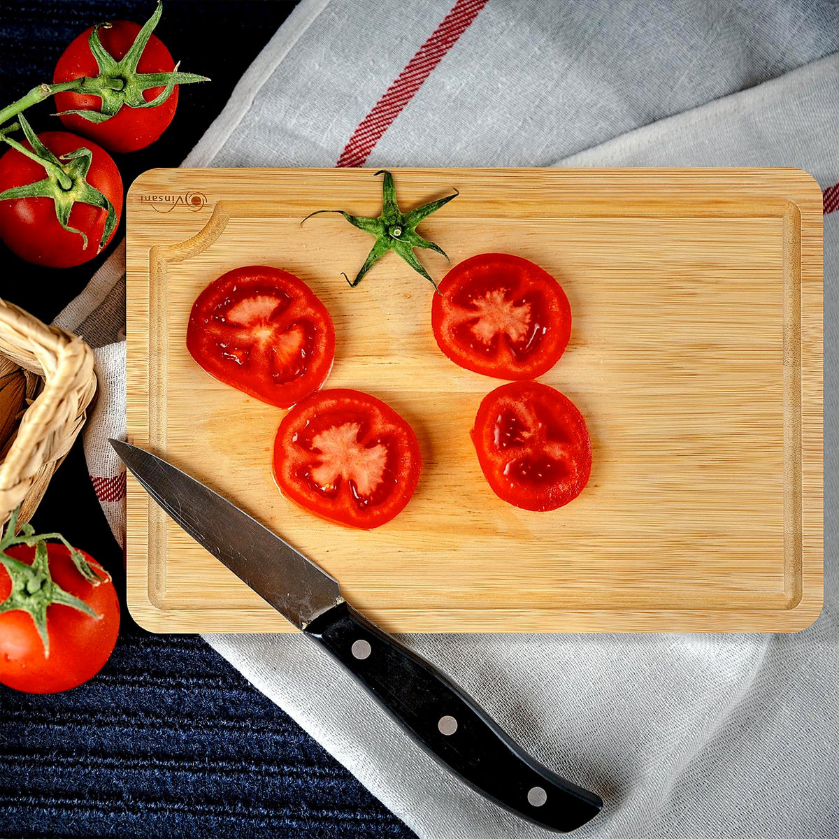 Bamboo chopping board with tomatoes