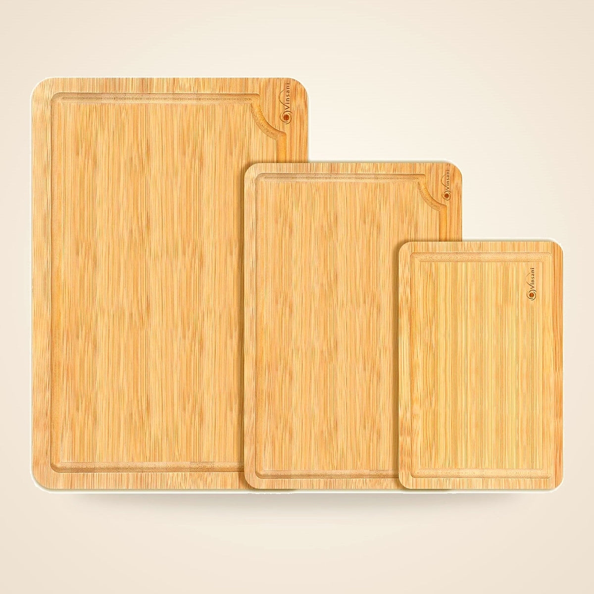 Three bamboo chopping boards in different sizes