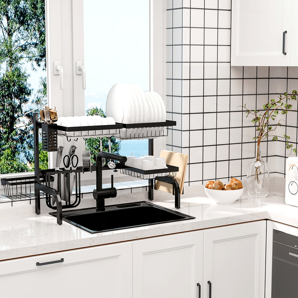 Over-the-sink dish drying rack in a bright kitchen