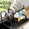 2-tier black dish drainer next to the kitchen sink