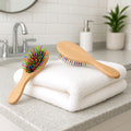 Wooden hairbrush set with folded towels