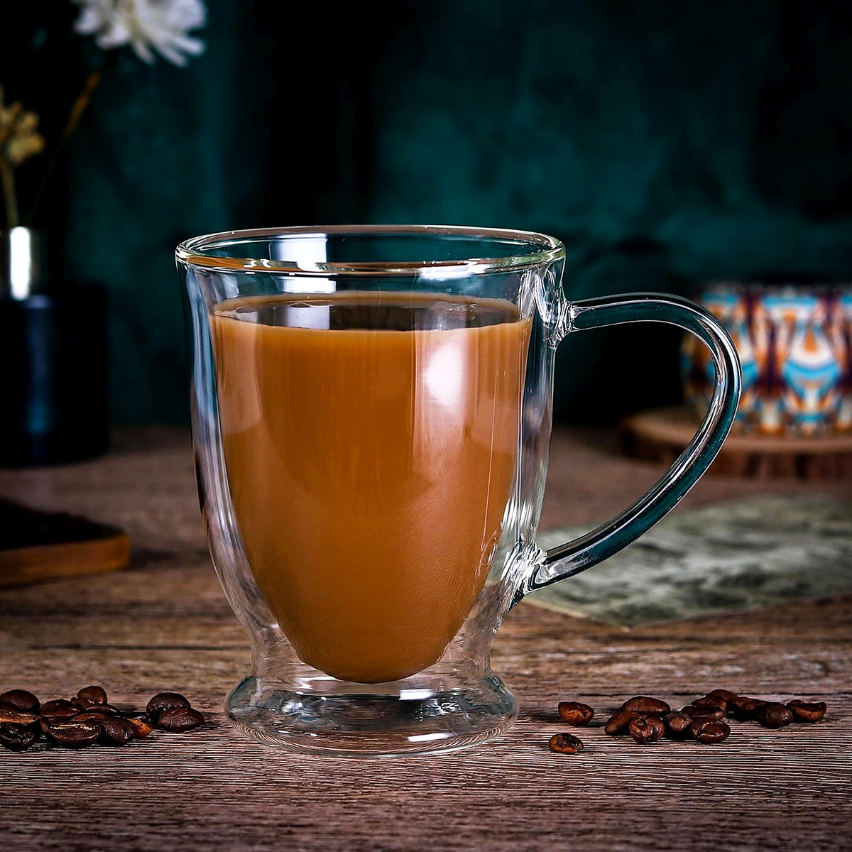 Double-walled glass cup with coffee