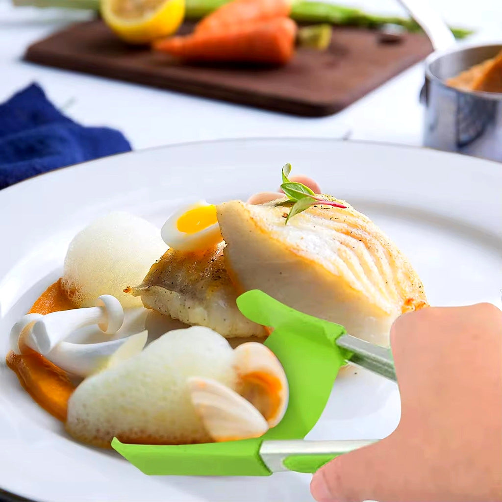 Serving fish with silicone spatula tongs