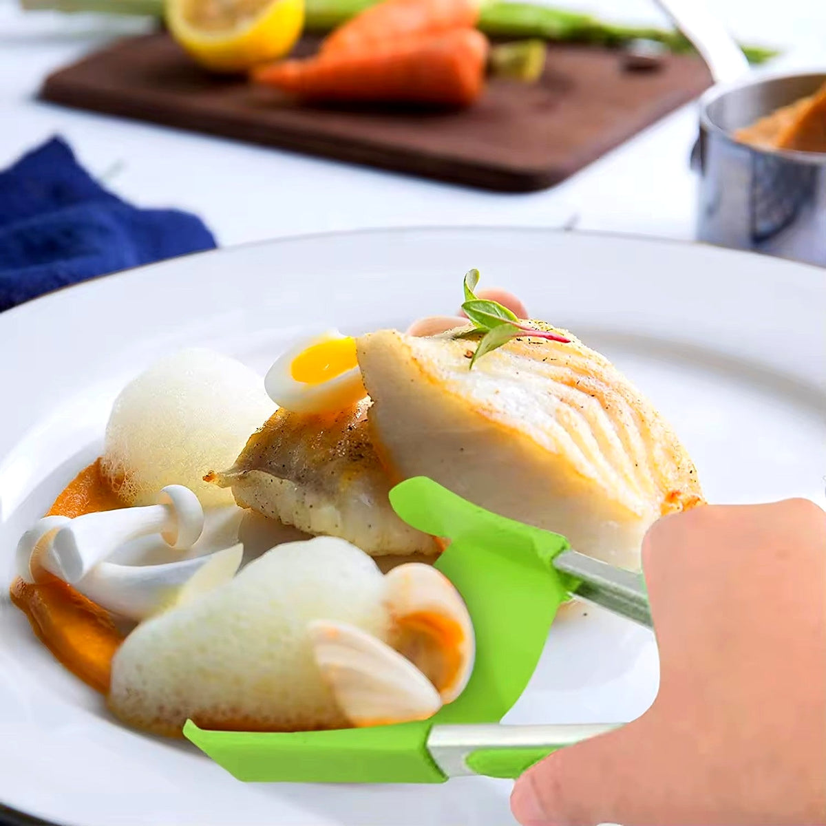 Serving fish with silicone spatula tongs