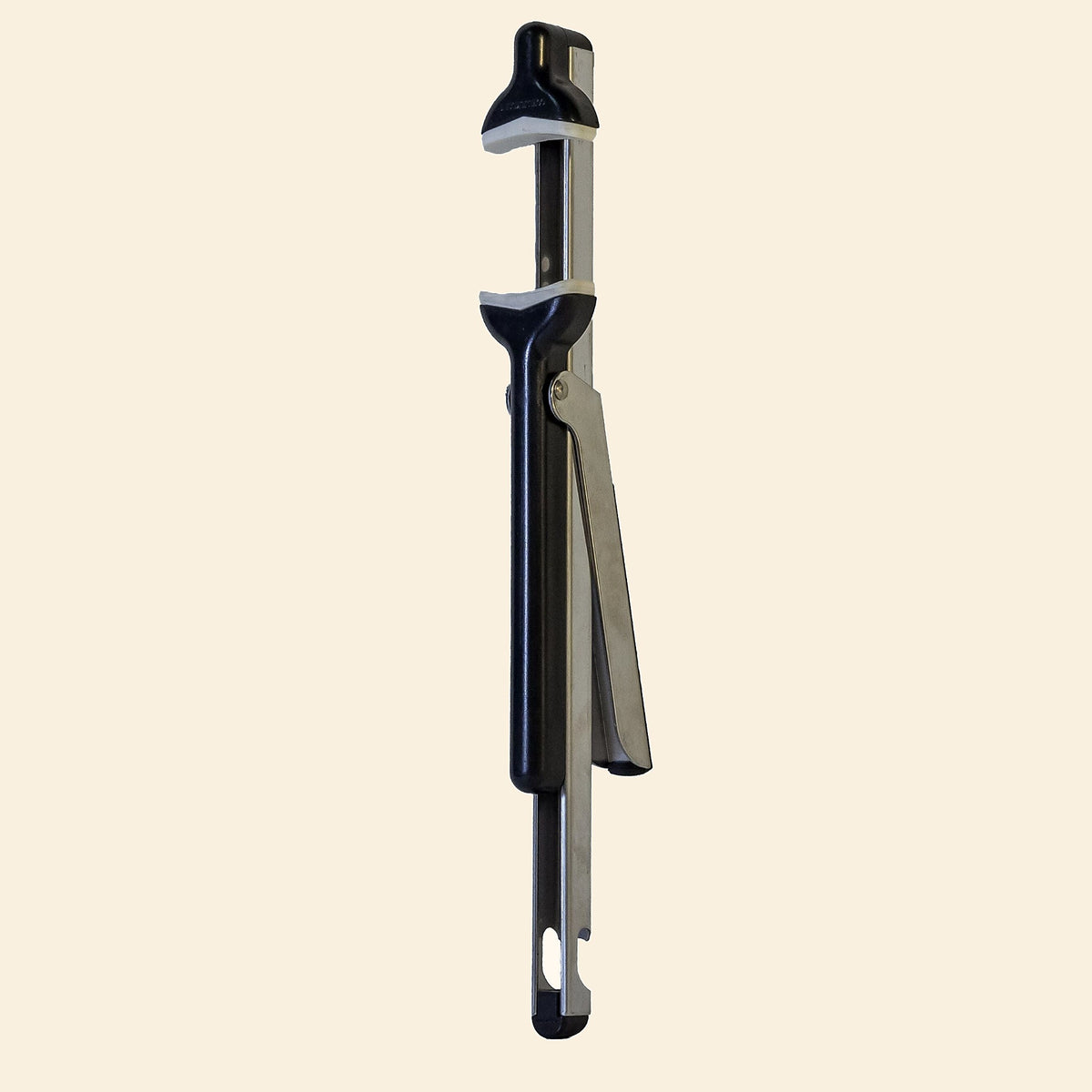 Adjustable stainless steel jar opener, closed