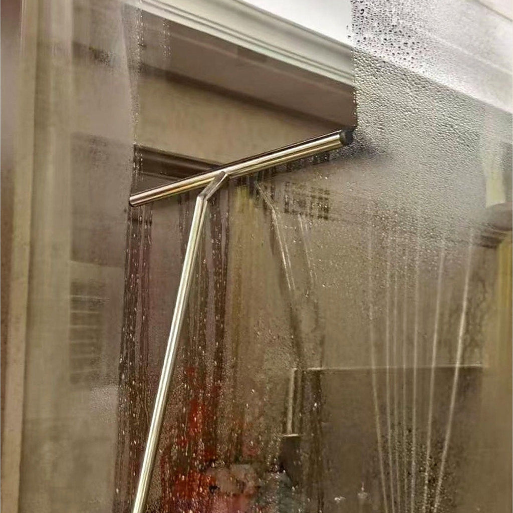 Telescopic squeegee on a shower screen