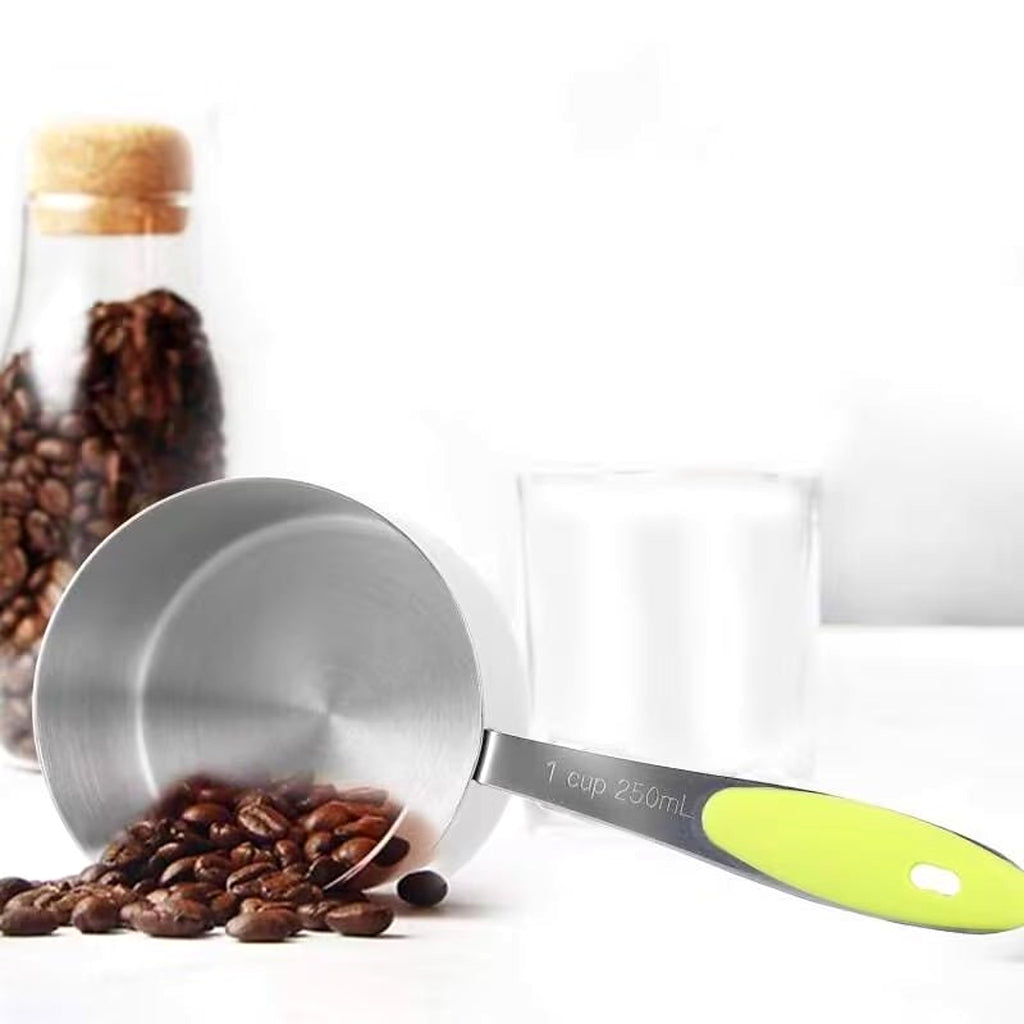 Measuring cup with coffee beans
