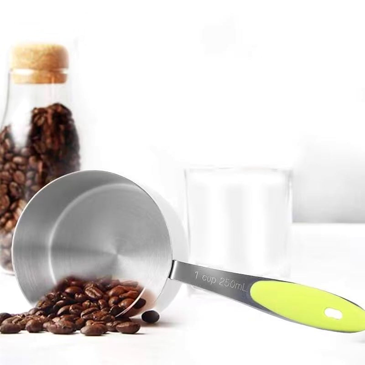 Measuring cup with coffee beans