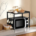 Extendable kitchen storage rack over the microwave
