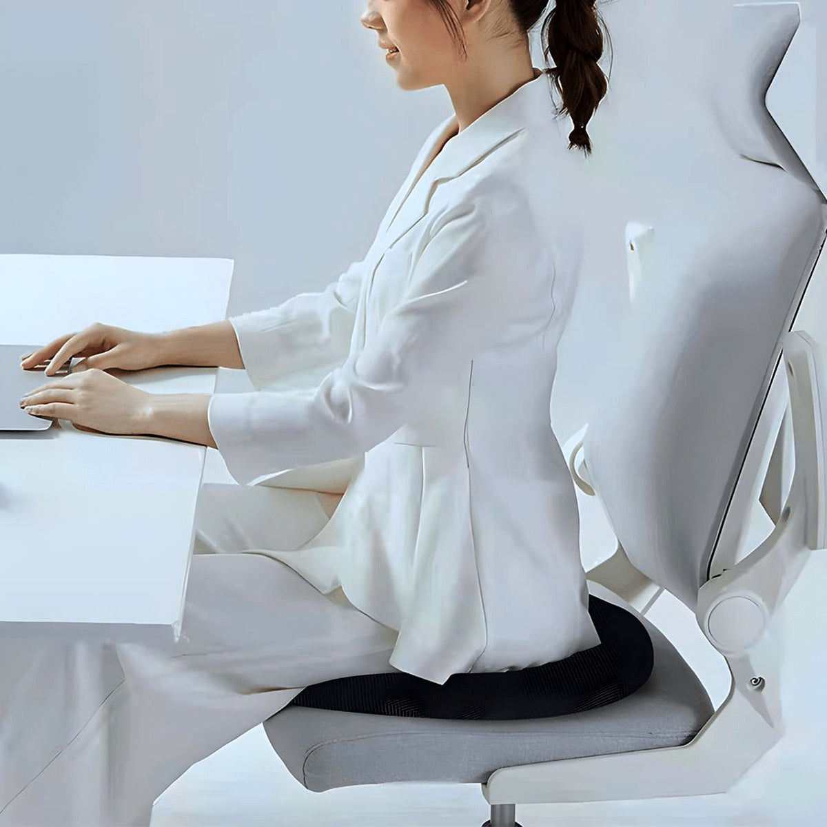 Cut-out memory foam seat cushion on an office chair