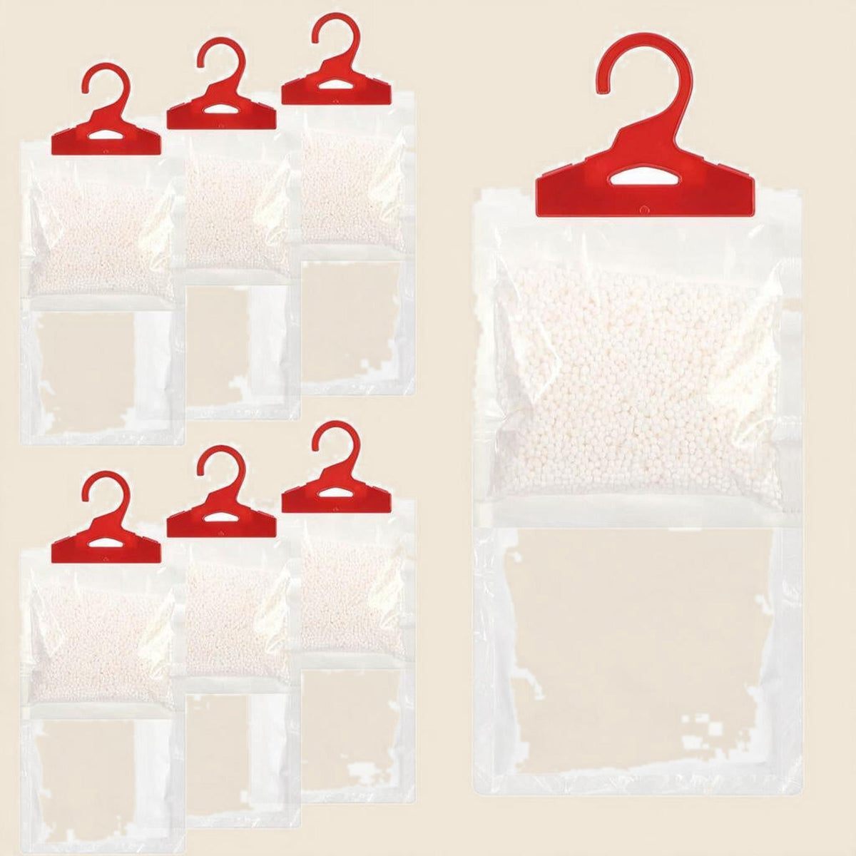 Six hanging wardrobe moisture absorber bags on a plain white background